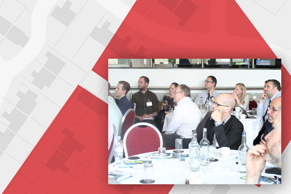 People sitting listening at a conference
