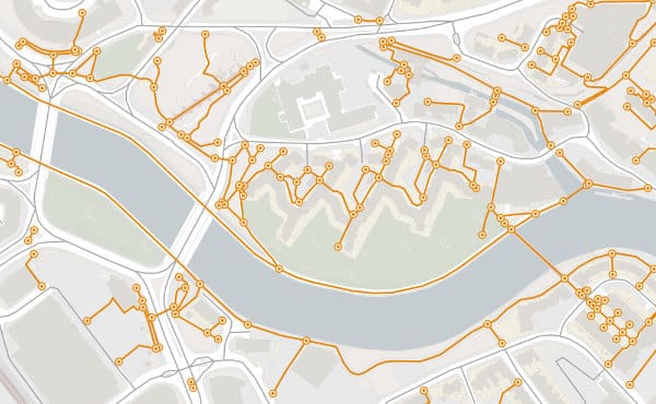 Sample image of OS Mastermap Highways Network Paths data overlaid OS MasterMap digital mapping. River in urban location.
