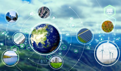 Blurred landscape with circles in front of planet Earth, solar, the sea, a lake, wind turbines, trees, cityscape and roads